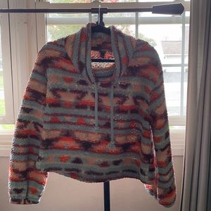 Aztec pattern cropped sweatshirt with loose turtle neck